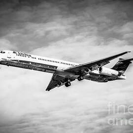 Delta Air Lines Airplane in Black and White by Paul Velgos