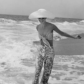 Diana Ewing Playing At A Beach by John Shannon