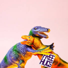 Dinosaurs Hugging by Juj Winn