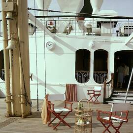 Directors Chairs In Front Of The Ship The Queen by Tom Leonard