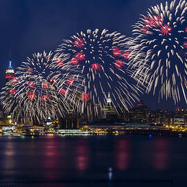 Fireworks and Full Moon Over New York City by Susan Candelario