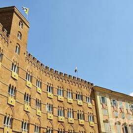 Flags on building on Piazza del Campo by Sami Sarkis Photography