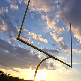 Football Goal at Sunset by Olivier Le Queinec