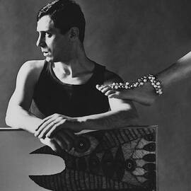 Gaetano Pompa With A Woman's Foot by Karen Radkai