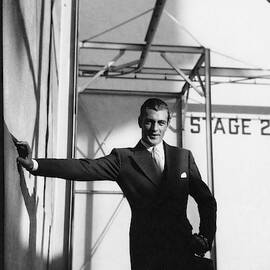 Gary Cooper Leaning On A Wall by Cecil Beaton
