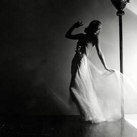 Ginger Rogers Wearing An Evening Gown by Horst P. Horst