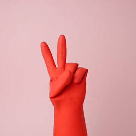 Hand In Red Rubber Glove Making Peace by Juj Winn