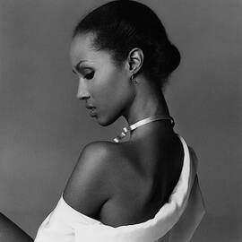 Iman Wearing A Necklace by Francesco Scavullo