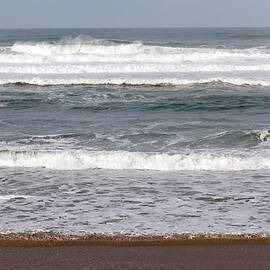 Incoming Tide Of Pacific Ocean On by Philaugustavo