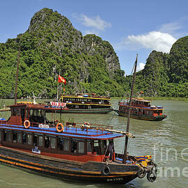 Junk boats in Halong Bay by Sami Sarkis Photography