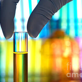 Laboratory Test Tube in Science Research Lab by Olivier Le Queinec