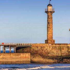 Lighthouses on the piers by Sue Leonard