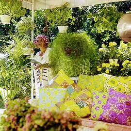 Lilly Pulitzer In Her Garden by Horst P. Horst