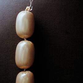 Links Of Liverwurst by Romulo Yanes