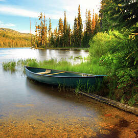 Lone Canoe On Shores Of Upper Payette by Anna Gorin