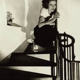 Loretta Young Sitting On A Staircase by Edward Steichen