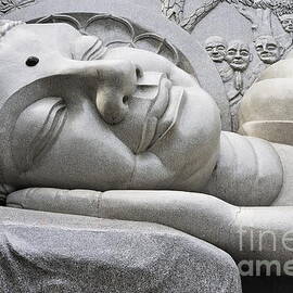Lying Buddha statue by Sami Sarkis Photography
