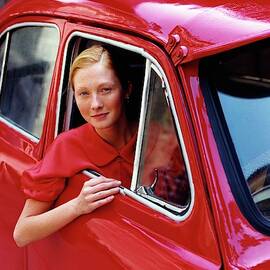 Maggie Rizer Sitting In A Vintage Car by Arthur Elgort
