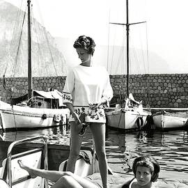 Marella Agnelli And Princess Pignatelli On A Boat by Henry Clarke