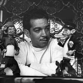 Mario Moreno With Two Dolls by Horst P. Horst