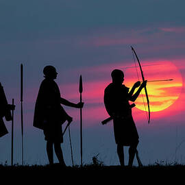 Masai Men Silhouetted At Sunrise by Adam Jones
