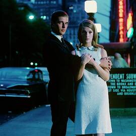 Melinda Moon And David Davis On A Sidewalk by Sante Forlano