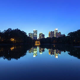 Midtown Atlanta Reflected In The Lake by Moreiso