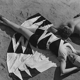 Models Lying On A Beach by George Hoyningen-Huene
