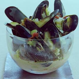 Mussels In Broth by Romulo Yanes