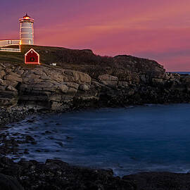 Nubble Lighthouse At Sunset by Susan Candelario