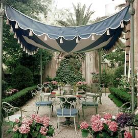 Outdoor Furniture On A Terrace by Tom Leonard