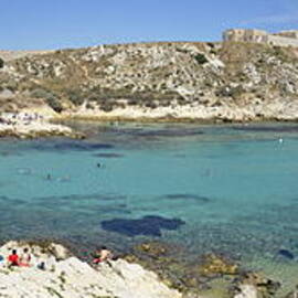 People at Sainte-Esteve beach by Sami Sarkis Photography