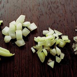 Piles Of Raw Onion by Romulo Yanes