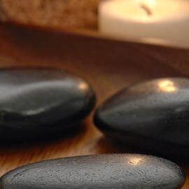 Polished Stones in a Spa by Olivier Le Queinec