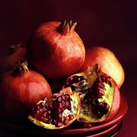 Pomegranates by Romulo Yanes