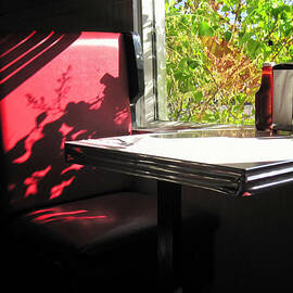 Red Diner Booth by Mary Lee Dereske
