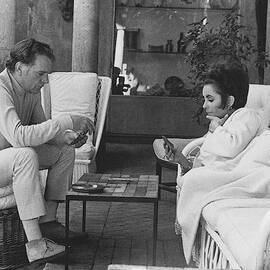 Richard Burton And Elizabeth Taylor Playing Gin by Henry Clarke