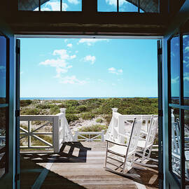 Rocking Chairs On Decking by Durston Saylor
