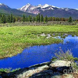 Rocky Mountains River by Olivier Le Queinec