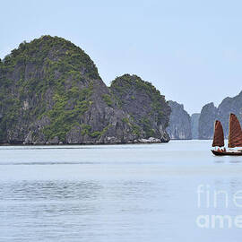 Sailing junk boats in Halong Bay by Sami Sarkis Photography