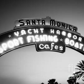 Santa Monica Pier Sign in Black and White by Paul Velgos