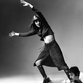 Serge Gainsbourg At The Foot Of Jane Birkin by Bert Stern