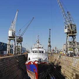 Ship being repaint in dry dock by Sami Sarkis Photography
