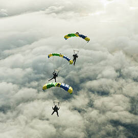 Skydivers In Mid-air by Johner Images