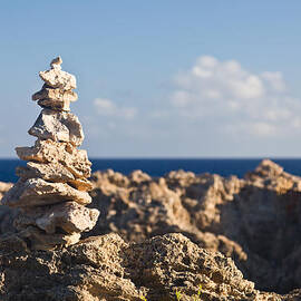 Stack of rocks on coast of Kauai by Steven Heap