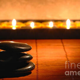 Stone Cairn and Candles for Quiet Meditation by Olivier Le Queinec