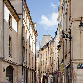 Street In Central Paris by Raimund Koch