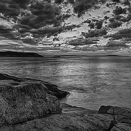 Sunrise At Monument Cove by Jeff Sinon