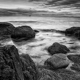 Surf Among The Boulders With Whaleback Light by Jeff Sinon