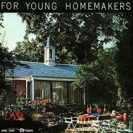 The Exterior Of A House And Patio Furniture by Nowell Ward